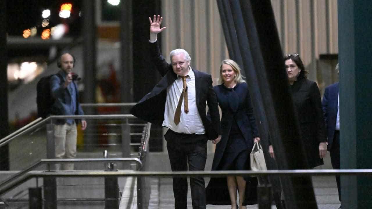 Assange returns as US insists his actions risked lives