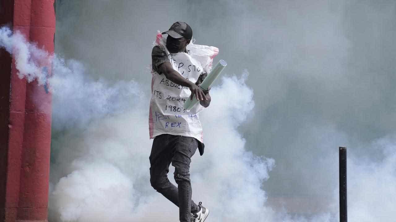 Kenya police clash with protesters as tax plan dropped