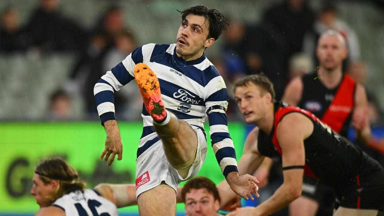 Geelong continue hoodoo over Bombers at wet MCG