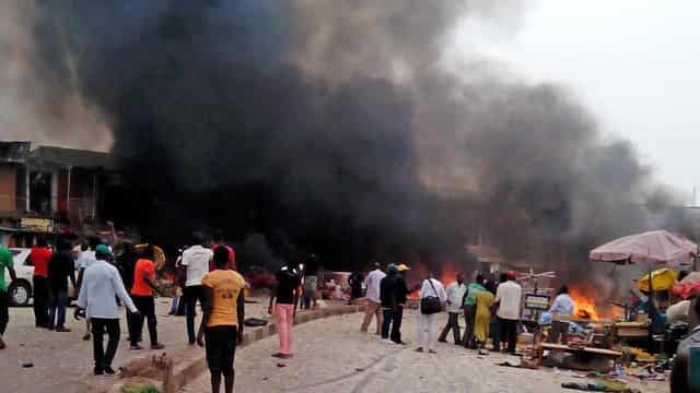 Suspected suicide bombers kill at least 18 in Nigeria