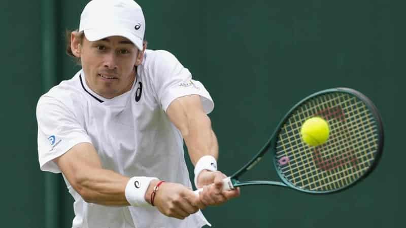 De Minaur overcomes dogged Duckworth and Wimbledon rain