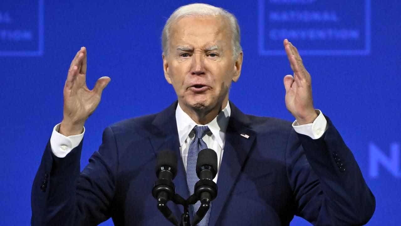 Biden pledges 'I am all in', criticises Trump policies