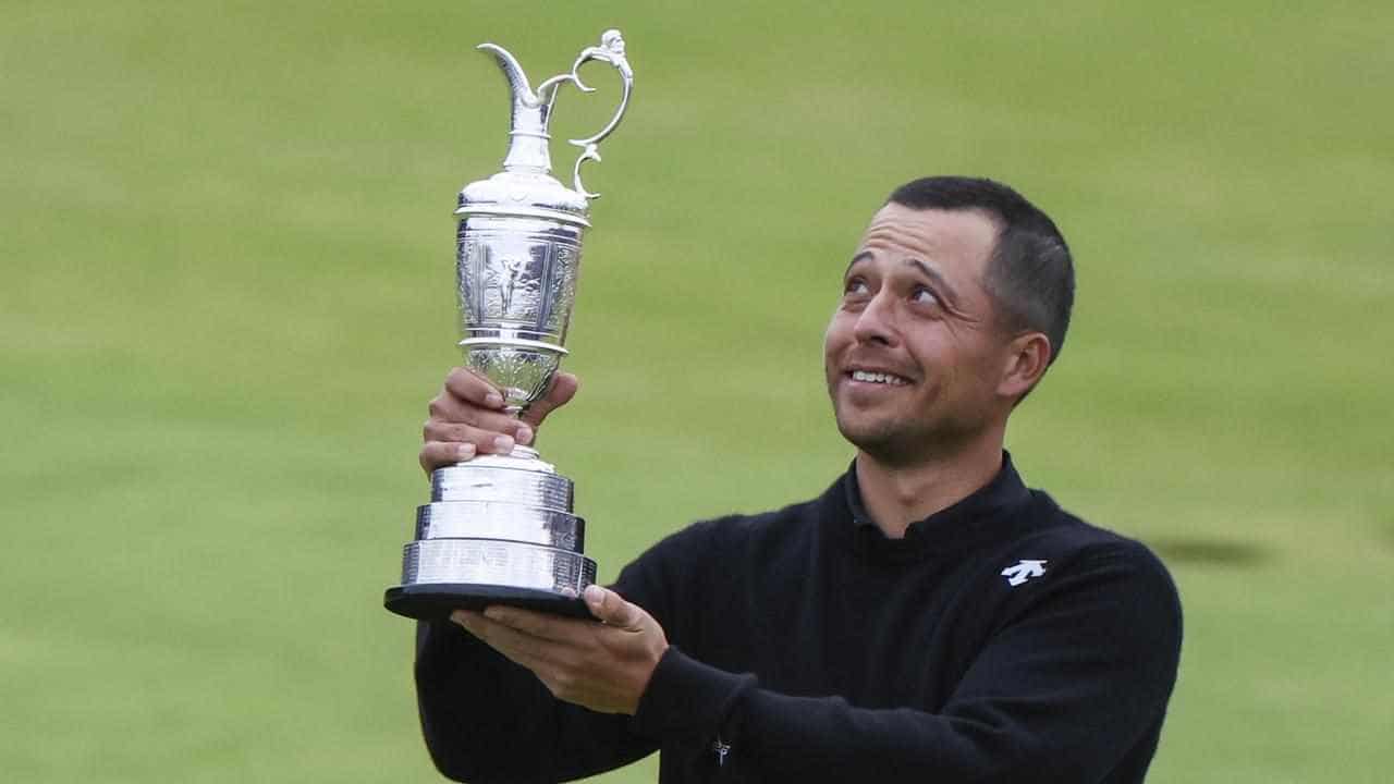 Schauffele roars to second major win of year at Open