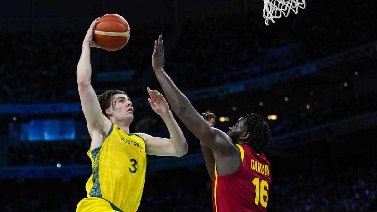 Boomers overcome Spain in fiery Games foul-fest