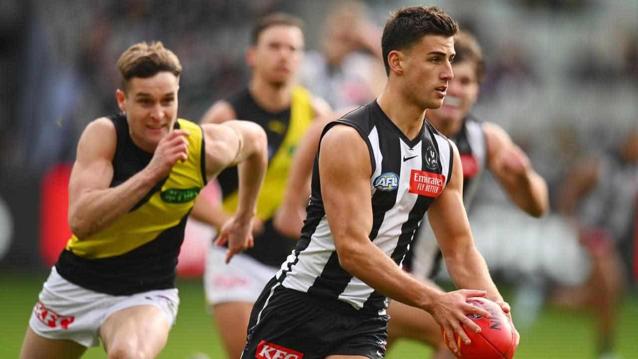 Daicos dazzles as Pies keep AFL finals hopes alive