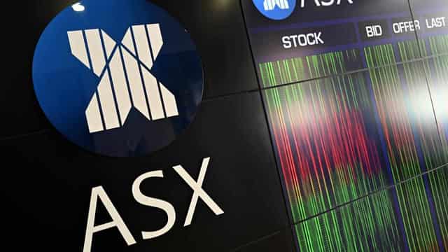 ASX hits record high, dollar sinks as inflation cools