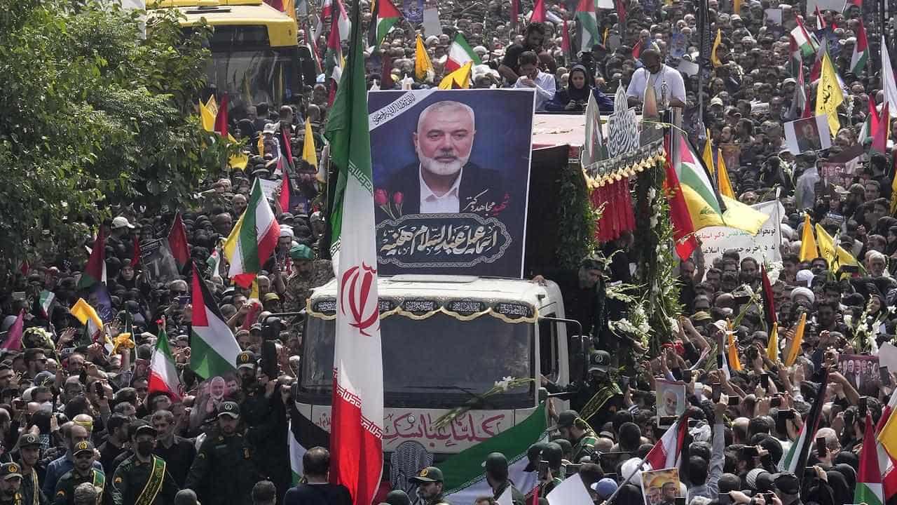 Iran’s supreme leader prays over the coffin of Haniyeh