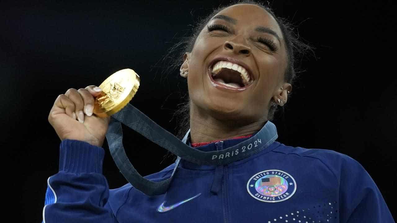 Dazzling Biles vaults to her seventh Olympic gold medal