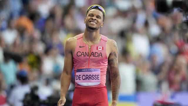 Olympic champion De Grasse to run without banned coach