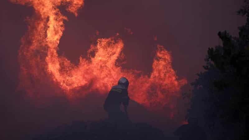 One dead as Greek wildfire burns in Athens suburbs