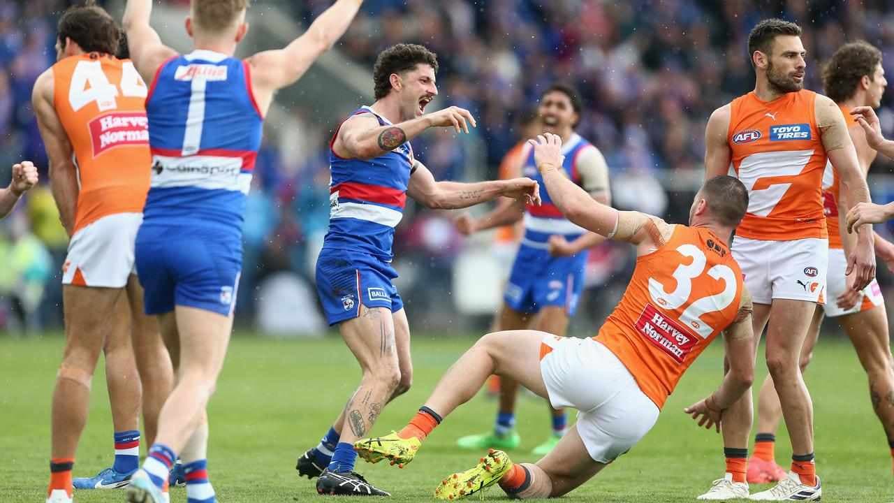 Resilient Dogs seal finals berth with win over Giants