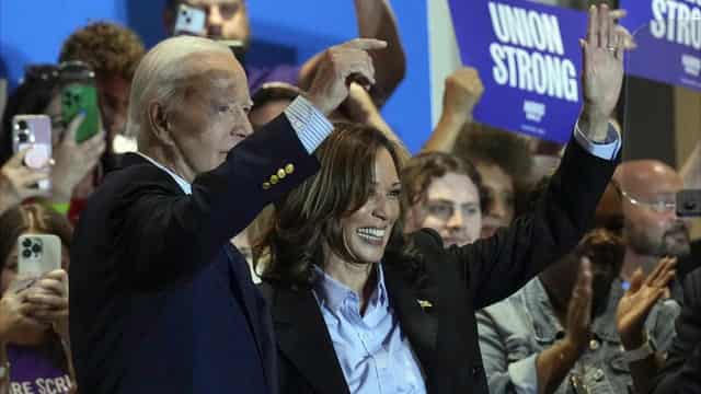 Harris pitches to union workers with Biden at her side