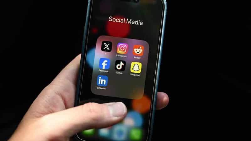 Scams target children on social media amid age debate