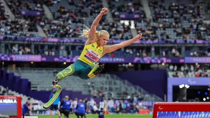 Low claims long jump gold as Ballard goes on attack