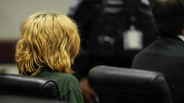 Teen school shooting suspect appears shackled in court