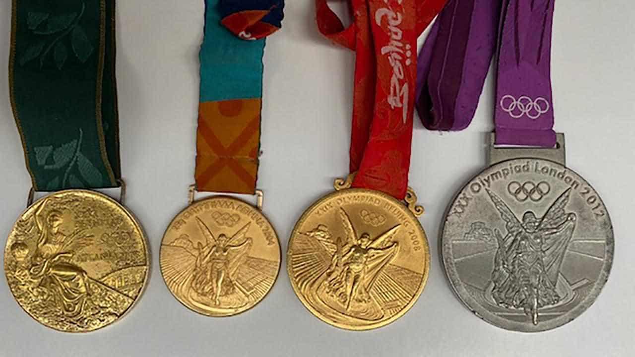 Man charged but no sign of missing Olympic medals