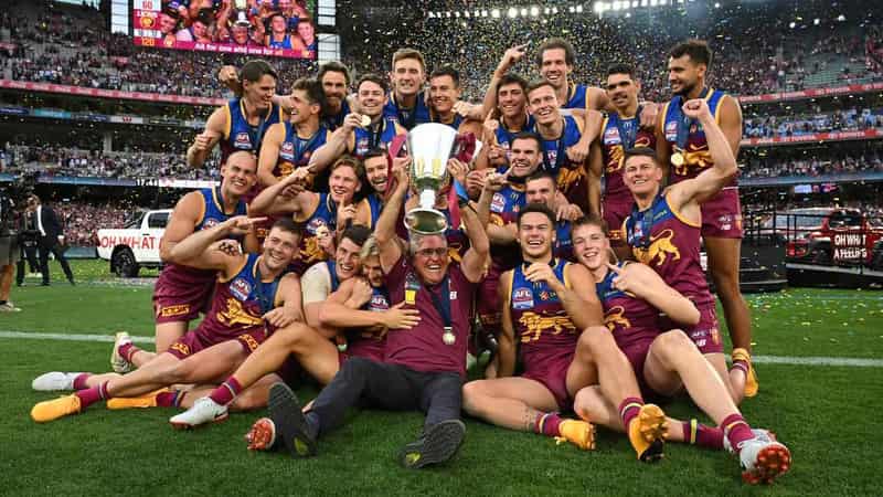 Resilient Lions claim AFL flag with huge win over Swans