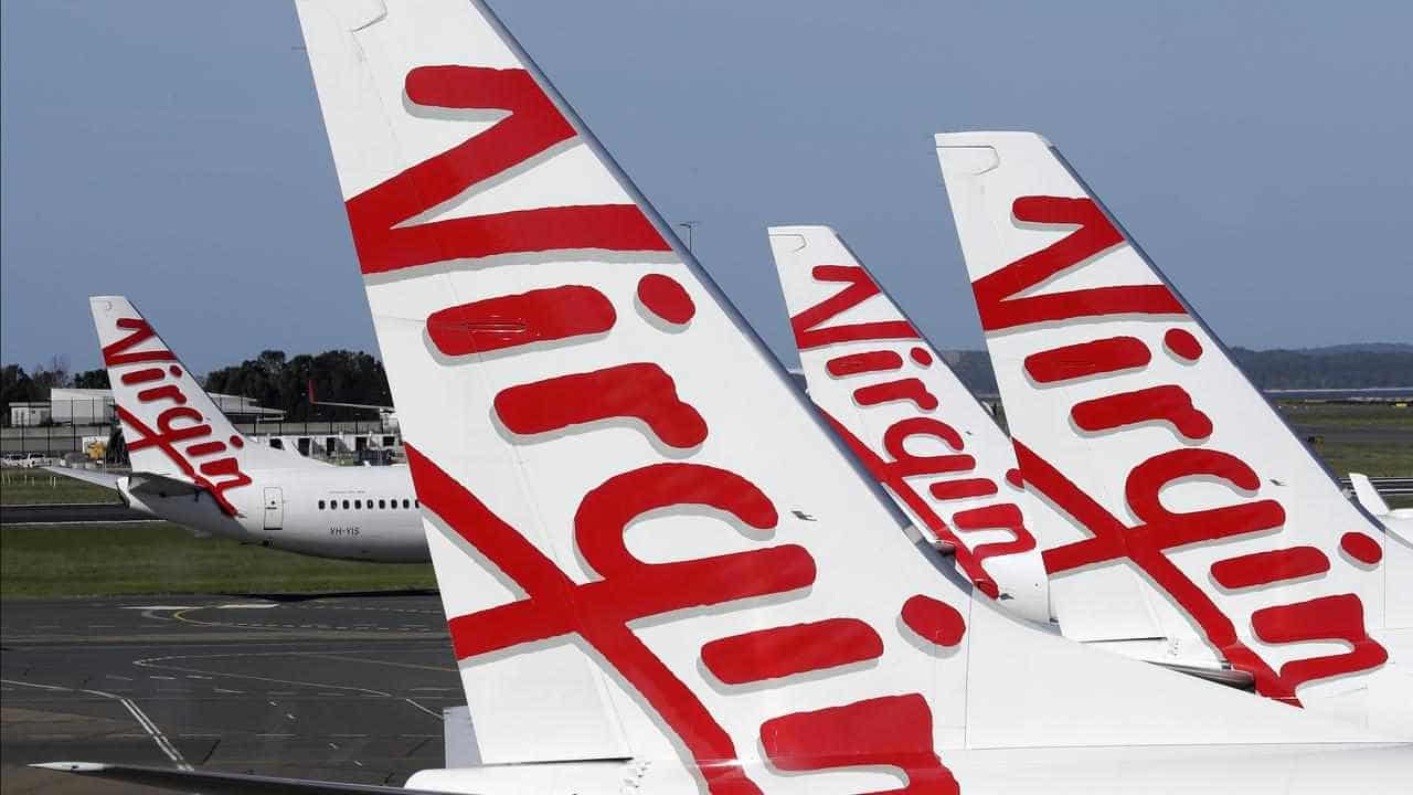 Travellers to fly for less if Qatar lands Virgin deal