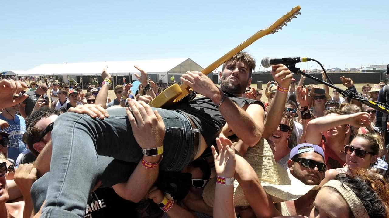 Quit stage diving at concerts, insurers tell musicians