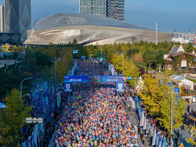 30,000 Marathon Enthusiasts Ignite the Beauty of Dalian with Their Run