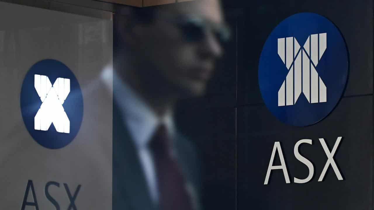 Aussie shares edge higher, snapping two-week win streak