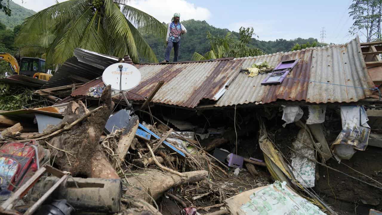 At least 115 dead or missing in flood-hit Philippines