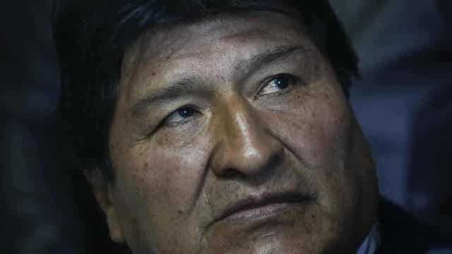 Bolivia's ex president's car shot at as tensions flare