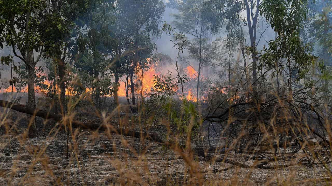 Country town in sights after fire burns home, bridge