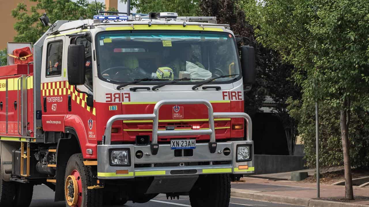 Firefighters contain huge industrial blaze in Sydney