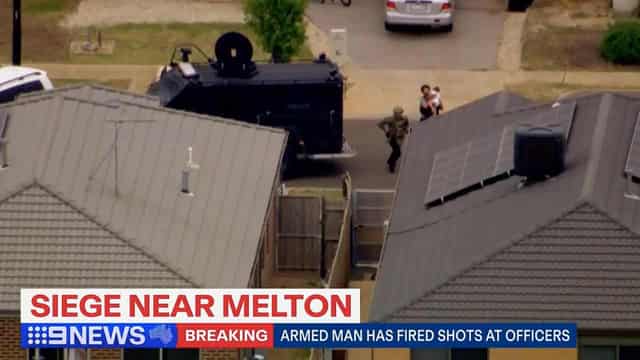 Man charged over siege and carjacking