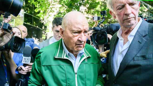 Silent Alan Jones to fight indecent assault charges