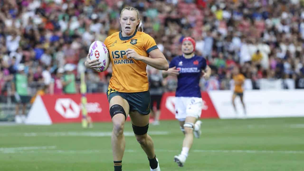 Australia's sevens teams seal Dubai quarter-final spots