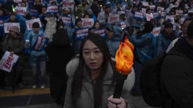 S.Korea's Yoon faces impeachment vote and treason probe