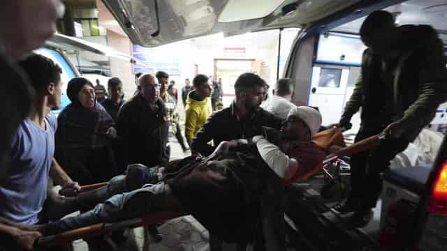 Gazans mourn Palestinians killed in post office attack