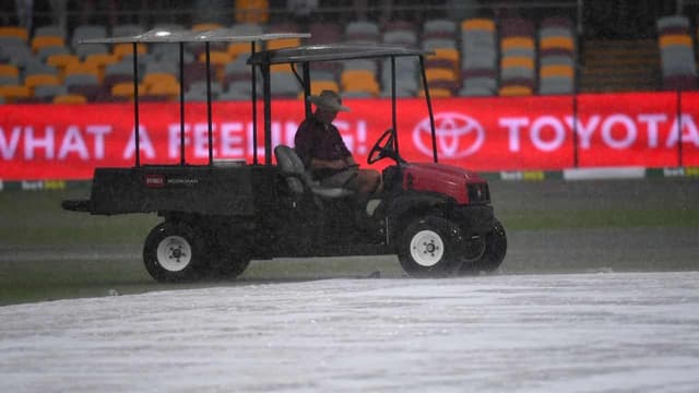 Australia survive before rain turns Gabba into a lake