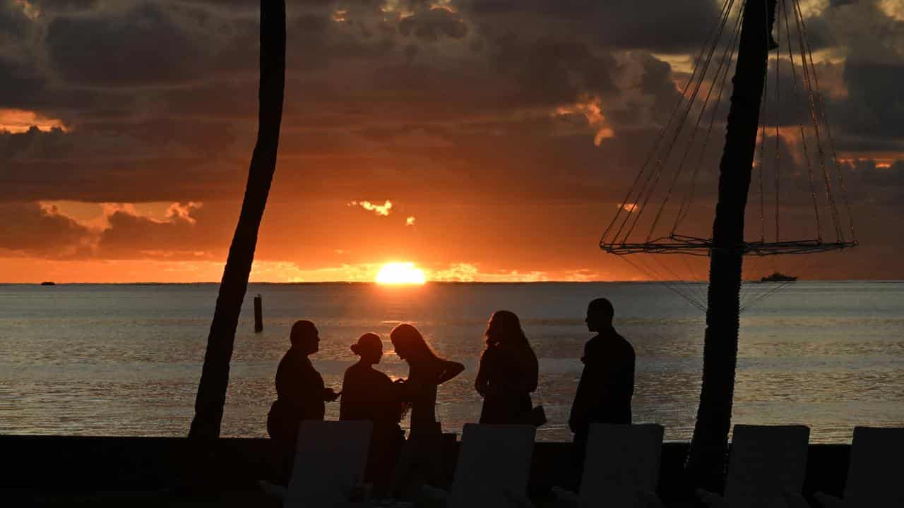 Fiji quells cocktail fears as Aussie recovers in ICU