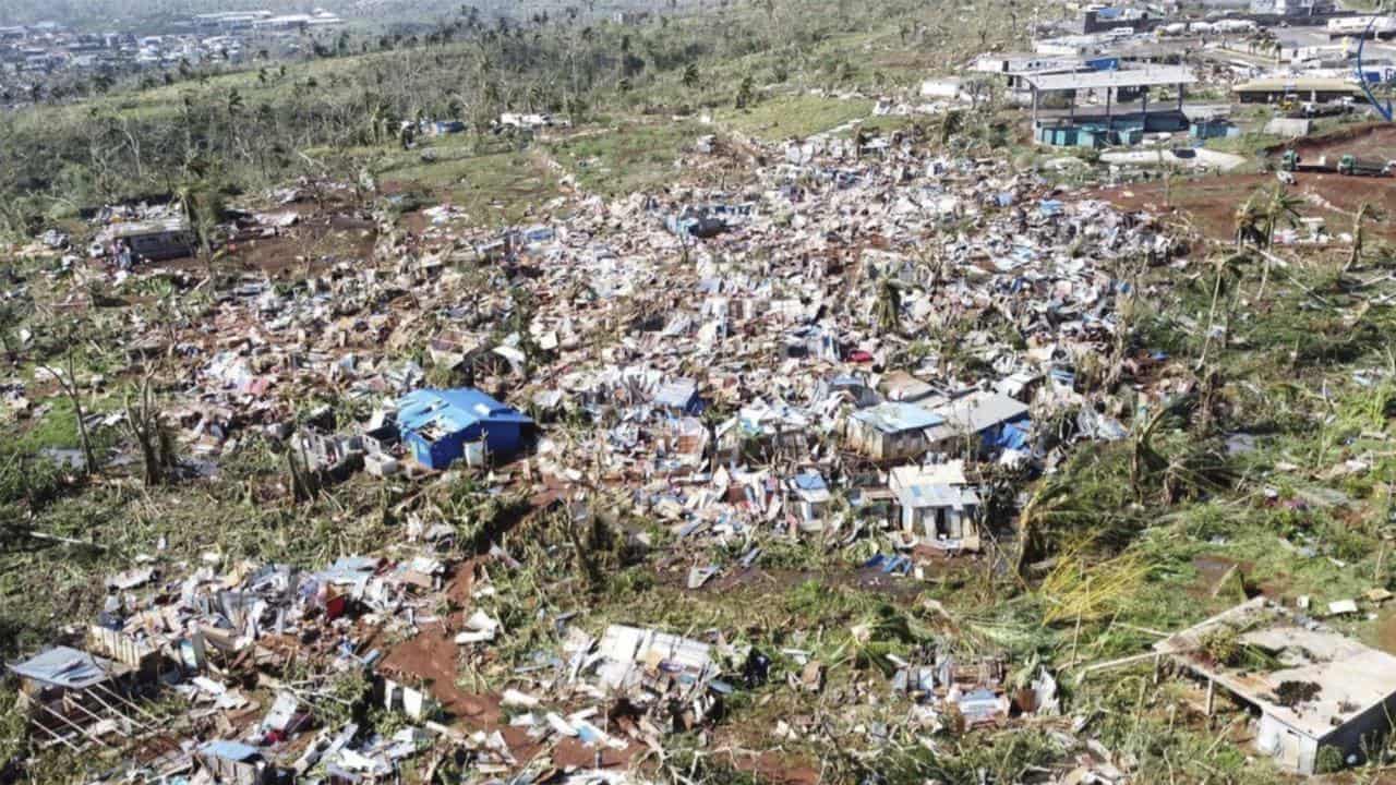 Families prepare aid after cyclone rips through Mayotte