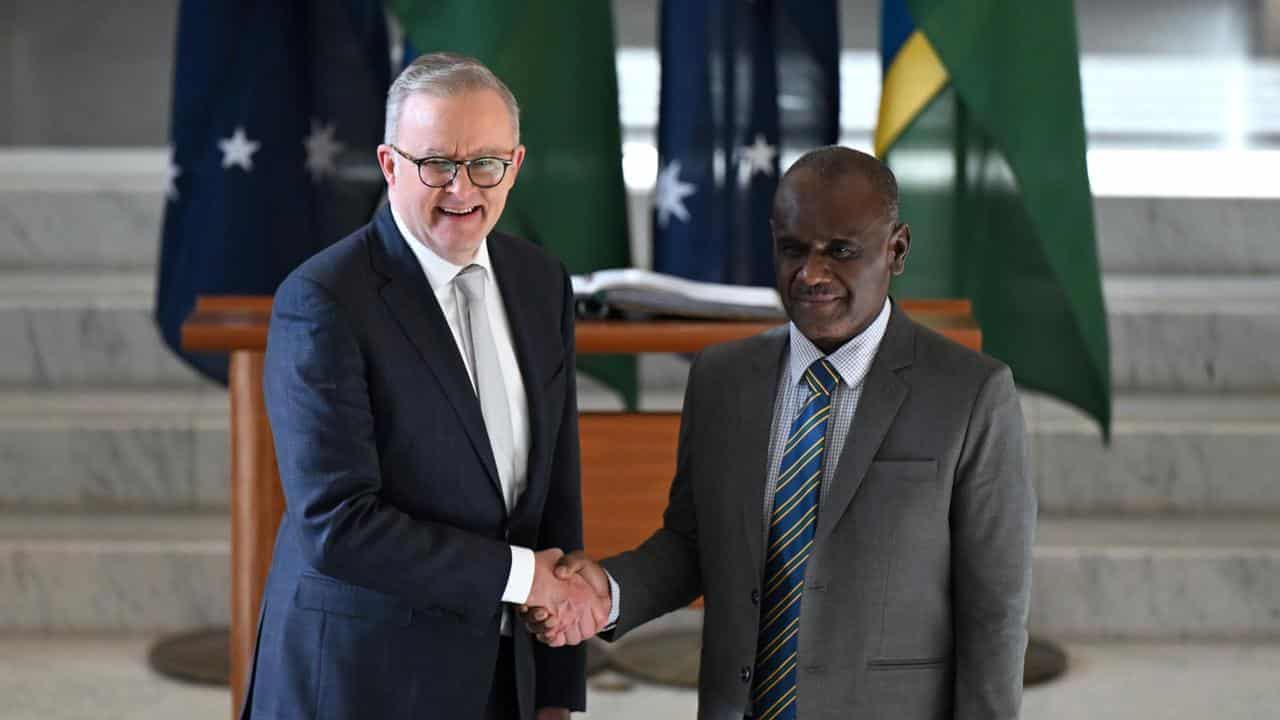 Australia boosts Solomons support as China pact stopgap