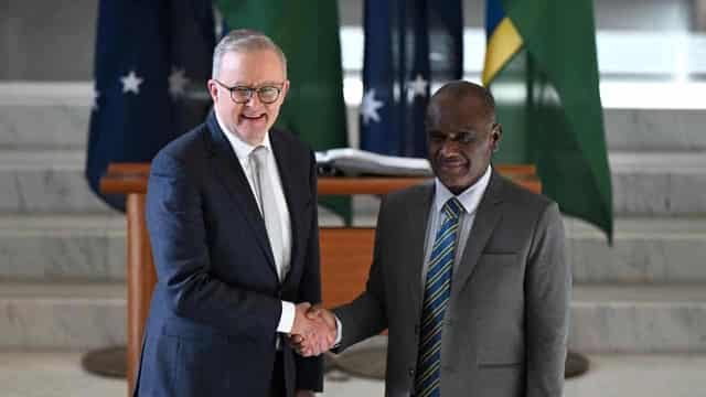 Australia boosts Solomons support as China pact stopgap