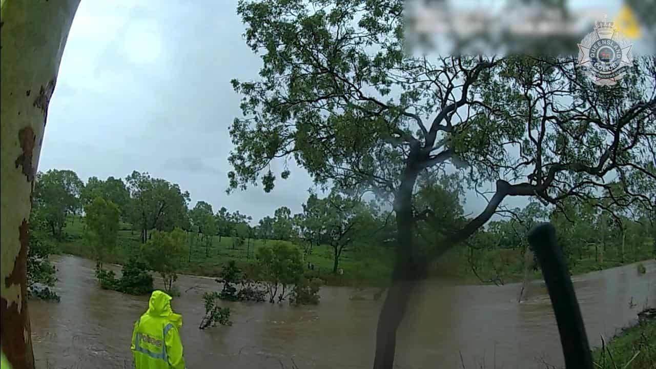 Children rescued in floodwaters as showers ease