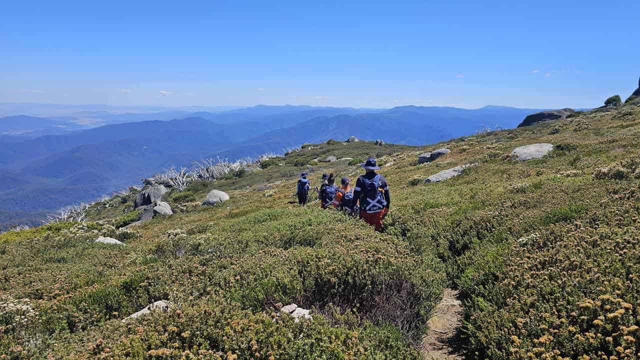 Search resumes for missing bushwalker amid heat, fire