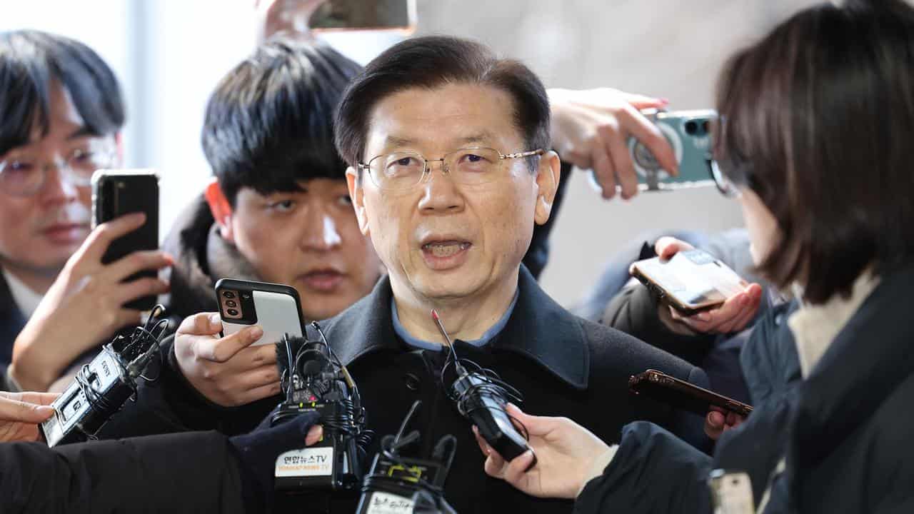 Yoon's security chief quits, warns against 'bloodshed'