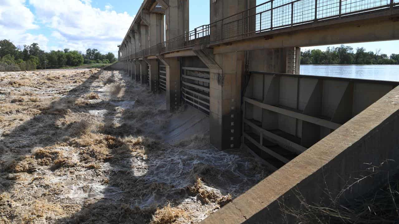 Search resumes for man in rain-swollen dam