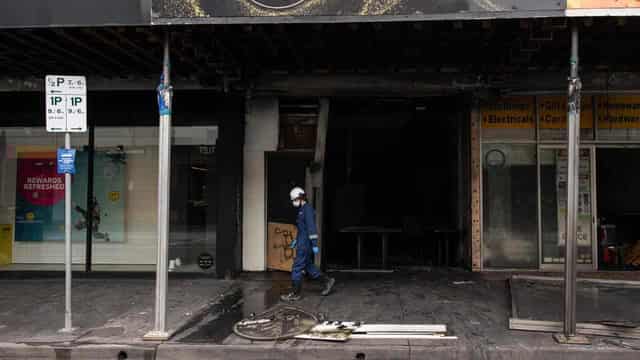 Man fighting for life after inner suburban shop torched