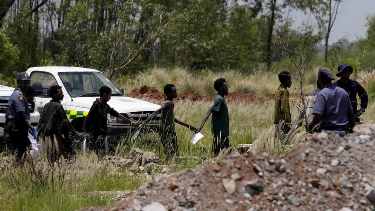 South Africa criticised as 78 corpses pulled from mine