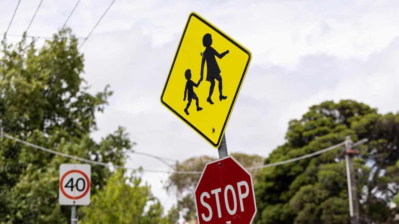 Back to school but more kids escorted over safety fears