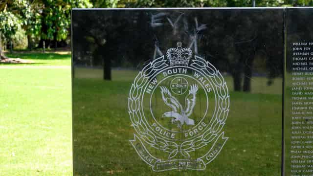 Man charged over vandalism of police tributes memorial