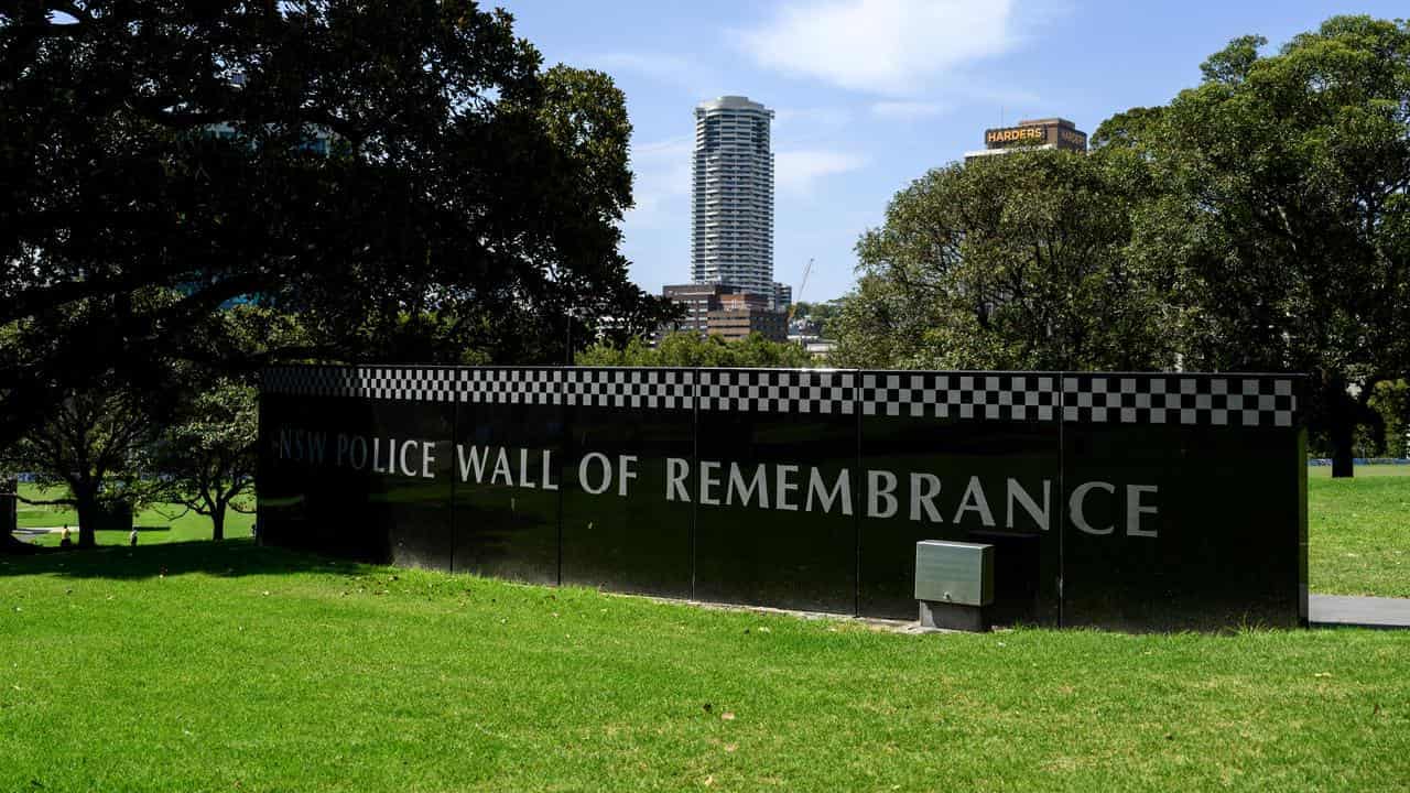 Man behind bars after 'odious' attack on cop memorial