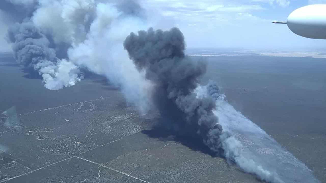 Winds, terrain could merge national park bushfires