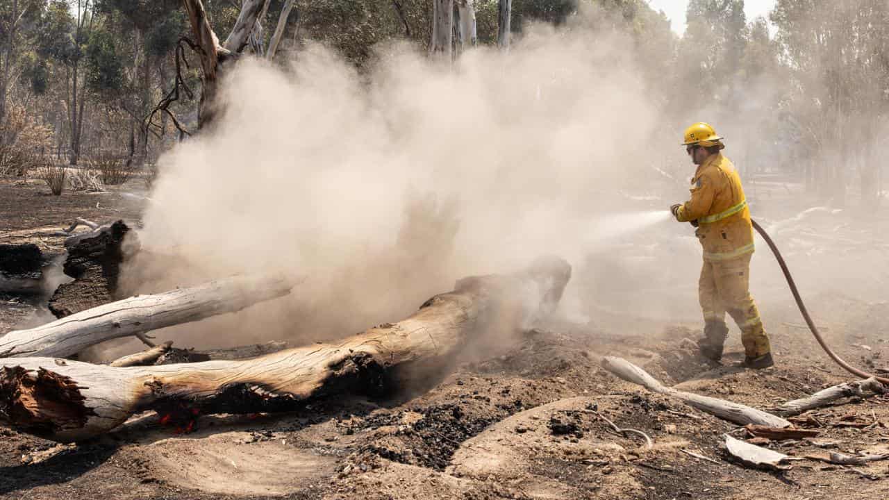 Firefighters rush to contain blazes ahead of heatwave